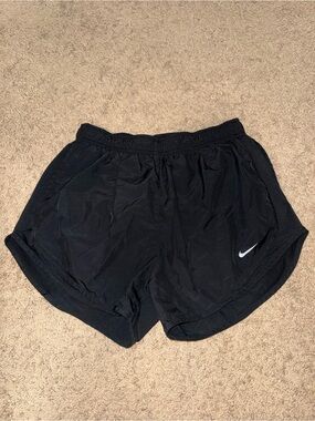 Nike Women’s black Athletic Shorts with White Swoosh